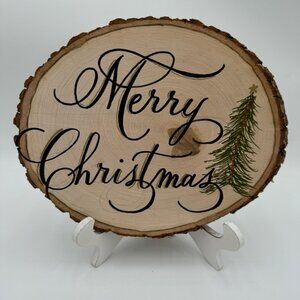 Natural hand cut wood slice hand painted with Merry. Christmas and Tree raw edge